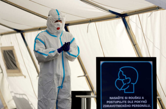 Medical staff members at sampling station in Prague