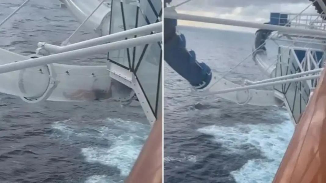 Επιβάτιδα κρουαζιερόπλοιου κόλλησε σε γυάλινη νεροτσουλήθρα πάνω από τον ωκεανό εν μέσω τυφώνα